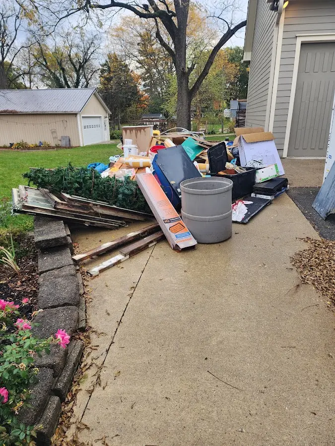 Dumpster being loaded with debris for Commercial Dumpster Rental in Pepper Pike